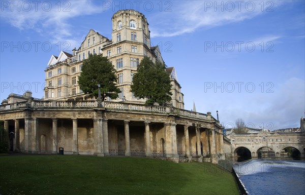 The former Empire Hotel, River Avon and Pulteney Bridge from Parade Gardens, Bath, Somerset, England, United Kingdom, Europe