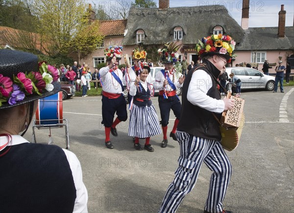 Traditional Morris Men doing country dancing in the village of Shottisham, Suffolk, England, United Kingdom, Europe