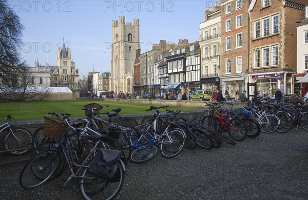 View over bicycles of King's Parade and Great St Mary's church, Cambridge, England, United Kingdom, Europe