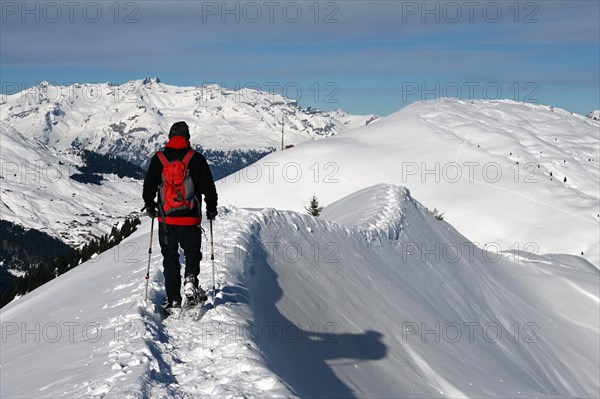 Snowshoe hiking in the Beverin nature park Park, Graubuenden, Switzerland, Europe