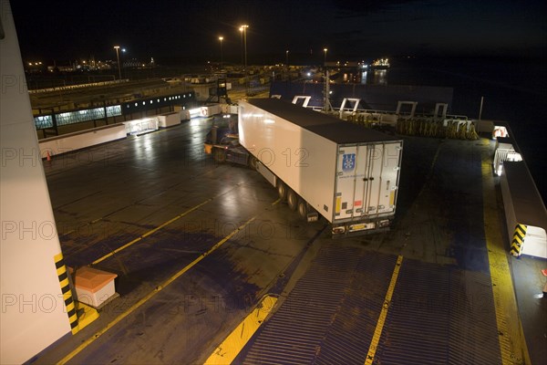 Loading heavy goods vehicle on to the overnight ferry to Netherlands at the port of Harwich, Essex, England, United Kingdom, Europe