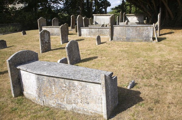 Old historic tombs and gravestones in churchyard at Mistley Towers, Essex, England, United Kingdom, Europe