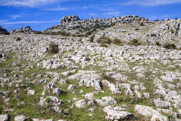 Dramatic limestone scenery of rocks shaped by erosion and weathering at El Torcal de Antequera national park, Andalusia, Spain, Europe