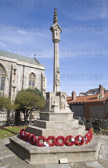 War memorial with remembrance wreaths, Cromer, Norfolk, England, United Kingdom, Europe