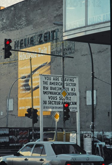 Checkpoint Charlie with building of the Union-Druckerei, a company of the CDU of the GDR, on whose facade old newspaper advertisements can still be seen, around 1999, Friedrichstrasse, Berlin, Germany, Europe