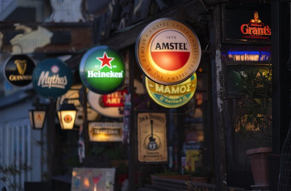 Illuminated advertising for beer brands, Logos, Amstel, Heineken, Mythos, Grants, Bar, Peraia, also Perea, Thessaloniki, Macedonia, Greece, Europe