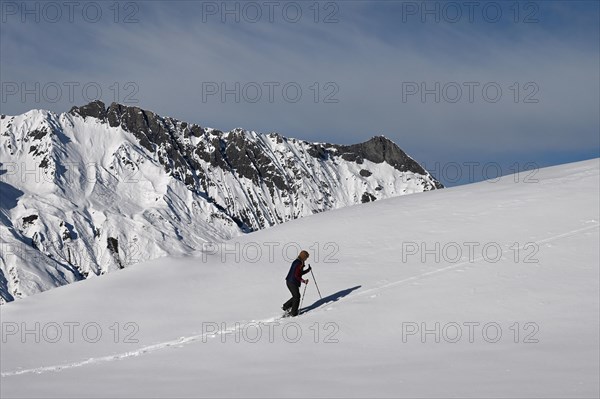 Snowshoe hiking in the Beverin nature park Park, Graubuenden, Switzerland, Europe