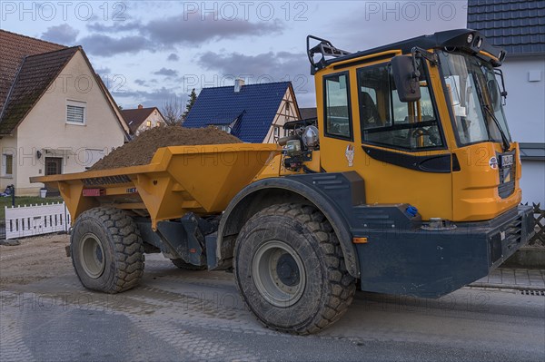 Loaded dump truck on a construction site, Bavaria, Germany, Europe