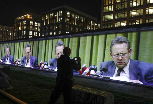 To mark the 30th anniversary of the fall of the Wall, 3D video projections of historical images and videos commemorate the events of the Peaceful Revolution and the opening of the Wall at original locations, such as here at the East Side Gallery, Gueter Schabowski, Berlin, 6 November 2019