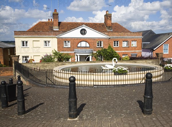 Swan basin pond and historic buildings, Mistley, Essex, England, United Kingdom, Europe