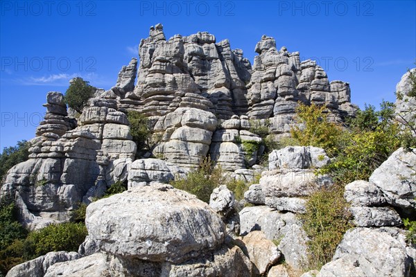 Dramatic limestone scenery of rocks shaped by erosion and weathering at El Torcal de Antequera national park, Andalusia, Spain, Europe