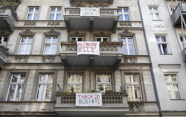 Protest by a tenants' initiative in Berlin's Kreuzberg neighbourhood. The building at Taborstrasse 20 was sold to property speculators. The tenants are calling on the Berlin district authority to exercise its right of first refusal in order to preserve the mill protection and ensure stable rents in the long term, 15 August 2019