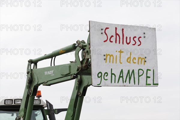 Tractor with a sign, Stop the banging, Farmers' protests, Demonstration against the policies of the traffic light government, Abolition of agricultural diesel subsidies, Duesseldorf, North Rhine-Westphalia, Germany, Europe