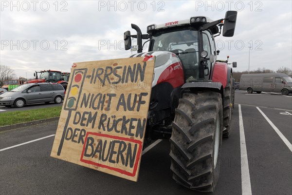 Not on the backs of farmers, placard on a tractor, farmers' protests, demonstration against policies of the traffic light government, abolition of agricultural diesel subsidies, Duesseldorf, North Rhine-Westphalia, Germany, Europe