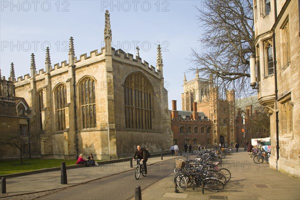 View to St John's college along Trinity Street, Cambridge, England with Trinity College chapel in foreground