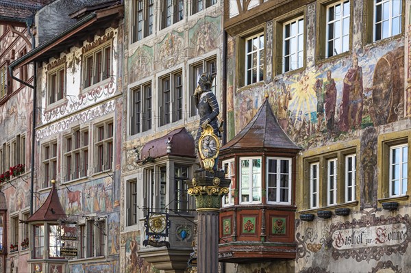 Historic facades with bay windows and the market fountain on the town hall square in the old town centre, Stein am Rhein, Lake Constance, Canton Schaffhausen, Switzerland, Europe