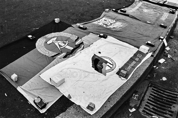 GDR flags on sale in October 1990 at the flea market at Potsdamer Platz, Berlin, Germany, Europe