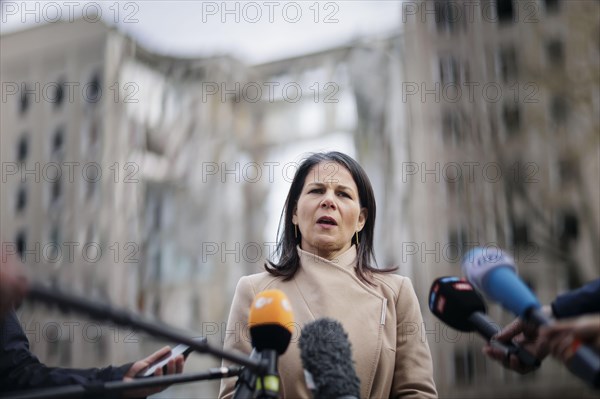 Annalena Baerbock (Alliance 90/The Greens), Federal Foreign Minister, gives a press statement in front of the destroyed building of the Mykolaiv regional administration. Mykolaiv, 25.02.2024. Photographed on behalf of the Federal Foreign Office