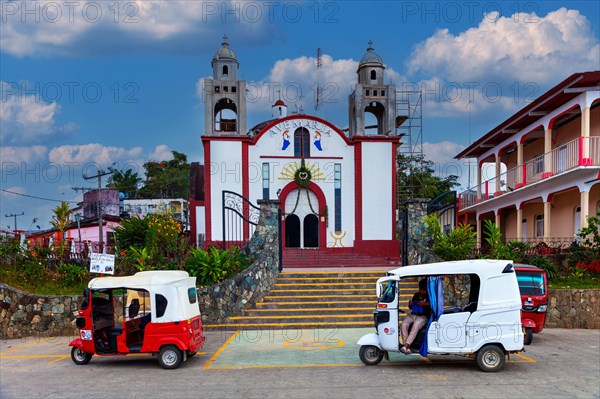 Motorbike taxi in front of the Inglesia Ave Maria church, Pluma Hidalgo, Pochutla, Oxaca state, Sierra Madre del Sur, Mexico, Central America