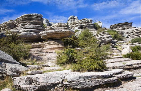 Dramatic limestone scenery of rocks shaped by erosion and weathering at El Torcal de Antequera national park, Andalusia, Spain, Europe