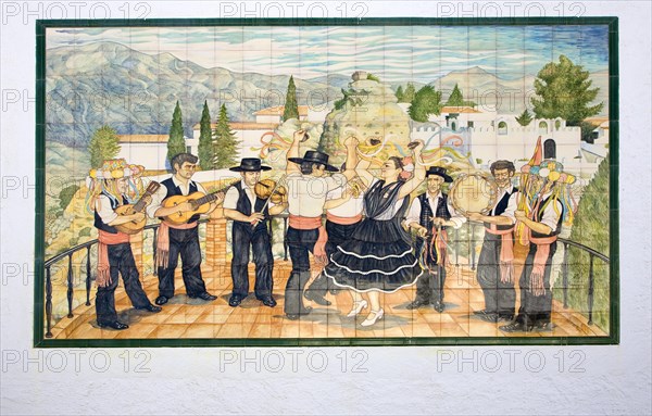 Ceramic tiles picture folk dancers musicians Comares village, Axarquia region, Malaga province, Andalusia, Spain, Europe