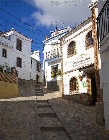 Tourist information building and alleyways in the Andalusian village of Comares, Malaga province, Spain, Europe