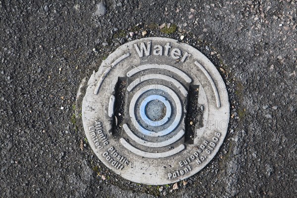 Plastic cover to water main from above, UK