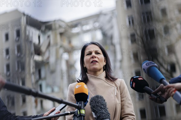 Annalena Baerbock (Alliance 90/The Greens), Federal Foreign Minister, gives a press statement in front of the destroyed building of the Mykolaiv regional administration. Mykolaiv, 25.02.2024. Photographed on behalf of the Federal Foreign Office