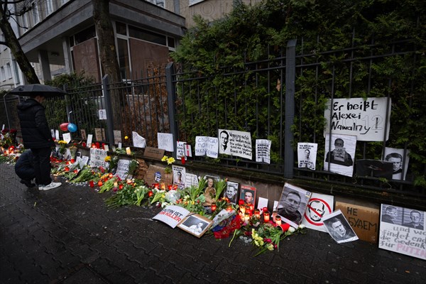 Photos, candles, grave lights and flowers for the Russian opposition leader Alexei Navalny, who died in an Arctic penal colony on 16 February 2024, have been placed on the fence of the closed Consulate General of the Russian Federation in Frankfurt am Main for days. Navalny was a Russian lawyer, anti-corruption activist, dissident and opposition politician. In 2020, he was the victim of a life-threatening poison attack. Politically persecuted and imprisoned from 2021, he was sentenced to many years in prison. He was considered an arch-enemy of Russian President Vladimir Putin, Consulate General of the Russian Federation, Frankfurt am Main, Hesse, Germany, Europe