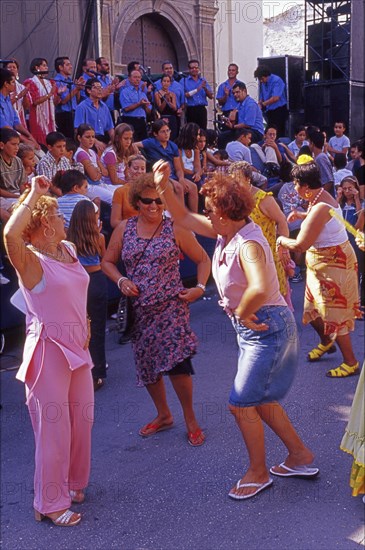 Elderly women dance flamenco at street party in Velez-Malaga, Andalusia, Spain, Southern Europe. Scanned thumbnail slide, Europe