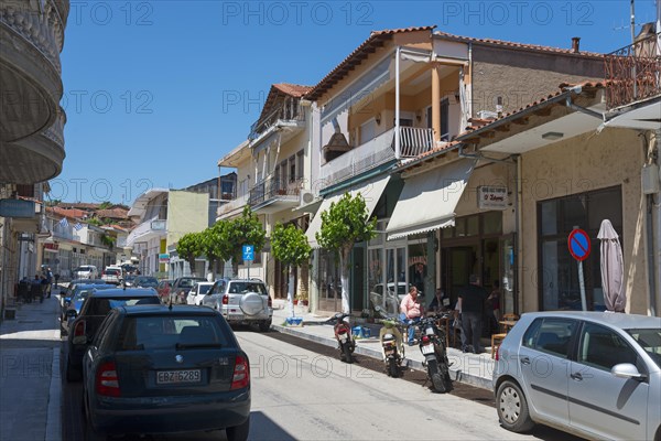 Urban street with shops, car parks and pedestrians on a sunny day, commercial street, Soufli, Eastern Macedonia and Thrace, Greece, Europe