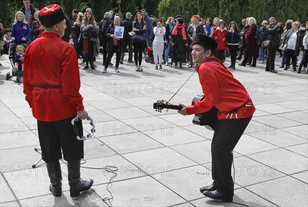 Musicians play Russian folk music on the 74th anniversary of the victory of Russia over Germany, at the Russian memorial in Treptower Park in Berlin, 09.05.2019