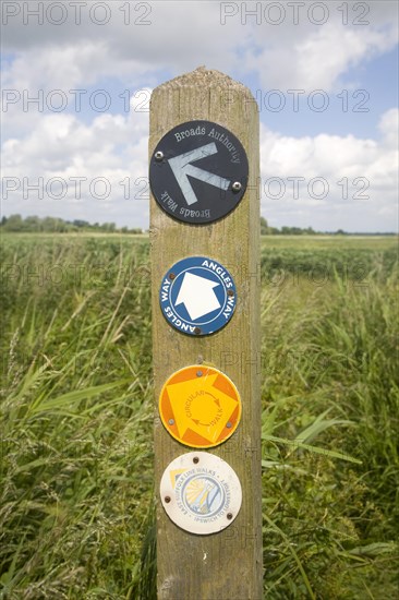 Route markers for Angles Way long distance footpath in marshes near Oulton Broad, Suffolk, England, United Kingdom, Europe