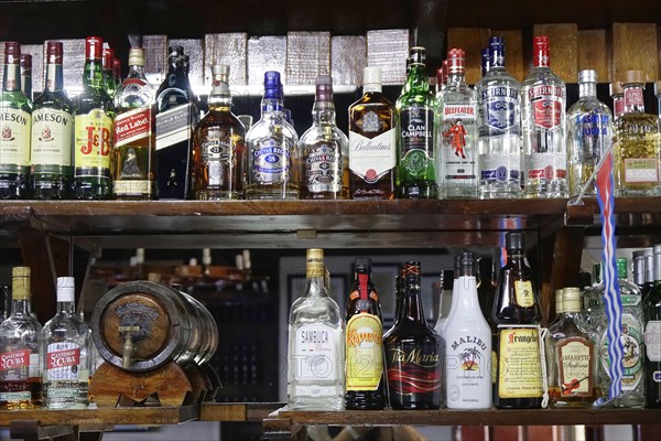 Rum bottles, liqueur bottles, restaurant near Santa Clara, Cuba, Greater Antilles, Caribbean, Central America, America, Central America