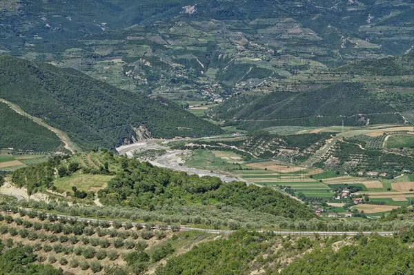 The valley of the river Osum on the western slope of the Tomorr massif and the southern Albanian mountain landscape m Tomorr National Park, also known as Tomorri National Park. Berat, Albania, Southeast Europe, Europe