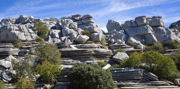 Dramatic limestone scenery of rocks shaped by erosion and weathering at El Torcal de Antequera national park, Andalusia, Spain, Europe