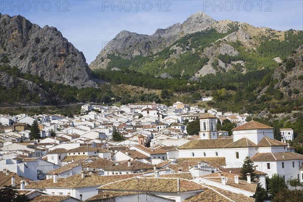 Limestone mountain peaks tower over the Village of Grazalema, Cadiz province, Spain, Europe