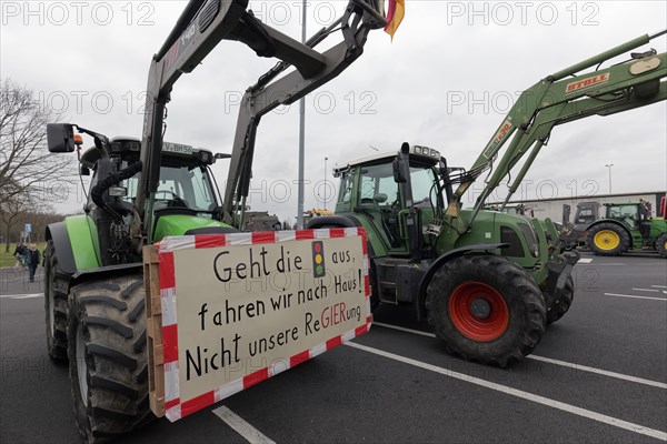 Tractor with sign, Not our government, Farmer protests, Demonstration against policies of the traffic light government, Abolition of agricultural diesel subsidies, Duesseldorf, North Rhine-Westphalia, Germany, Europe