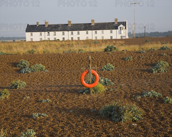 Row of white houses, Coastguard Cottages, at Shingle Street, Suffolk, England, United Kingdom, Europe