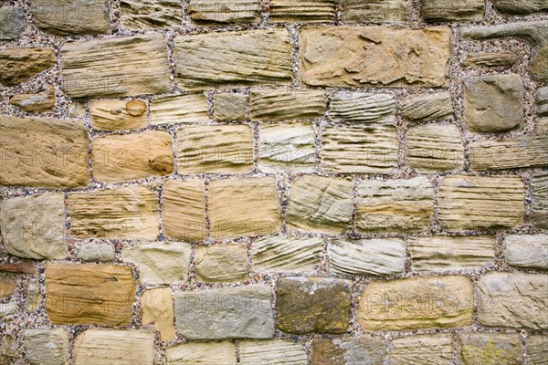 Grooves cut in sandstone blocks by wind erosion at Tynemouth priory, Northumberland, England, United Kingdom, Europe