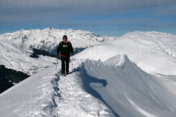 Snowshoe hiking in the Beverin nature park Park, Graubuenden, Switzerland, Europe