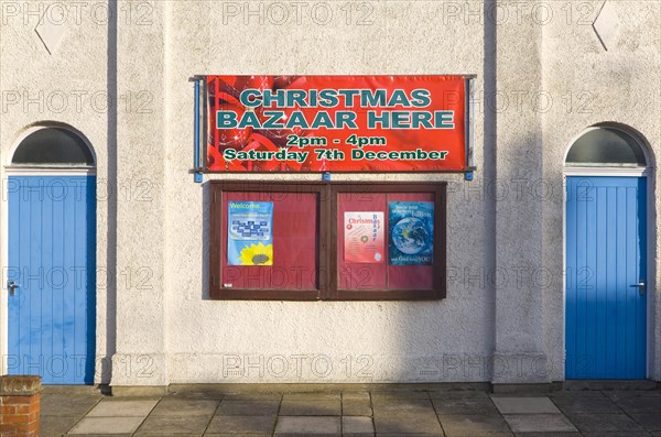 Christmas Bazaar event notice on church hall at Walton, Felixstowe, Suffolk, England, United Kingdom, Europe