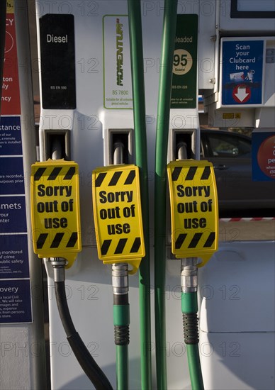 Petrol pumps with sign saying no fuel available