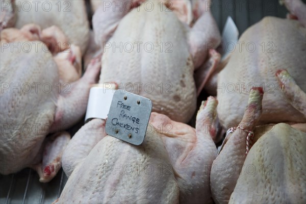 Free range chickens high quality food on display at Suffolk Food Hall, Wherstead, Suffolk, England, United Kingdom, Europe