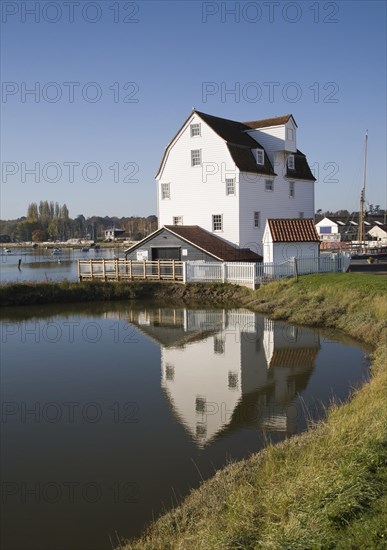 Tide mill pool reflection in mill pond Eiver Deben, Woodbridge, Suffolk, England. The present mill was built in 1793 on the site of more ancient mills and has been restored as a working mill and living museum