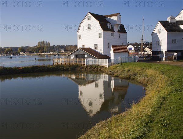 Tide mill pool reflection in mill pond Eiver Deben, Woodbridge, Suffolk, England. The present mill was built in 1793 on the site of more ancient mills and has been restored as a working mill and living museum