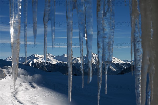 Icicle on a house in the Beverin nature park Park, Graubuenden, Switzerland, Europe