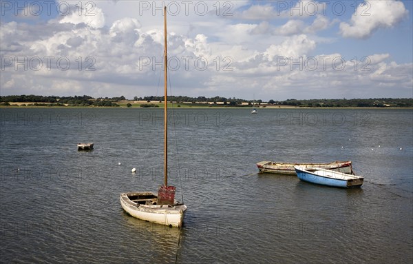 Boat for sale at moorings on the River Stour estuary at Mistley Walls, Mistley, Essex, England, United Kingdom, Europe