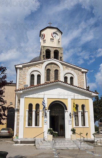 Facade of an orthodox church with a bell tower and Greek flag, Holy Church of the Assumption, Old Town, Kavala, Dimos Kavalas, Eastern Macedonia and Thrace, Gulf of Thasos, Gulf of Kavala, Thracian Sea, Greece, Europe