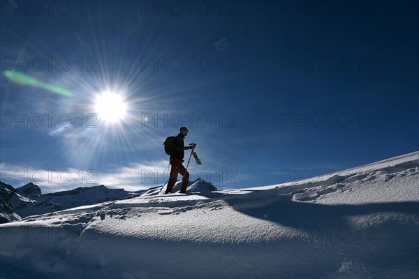 Snowshoe hiking in the Beverin nature park Park, Graubuenden, Switzerland, Europe